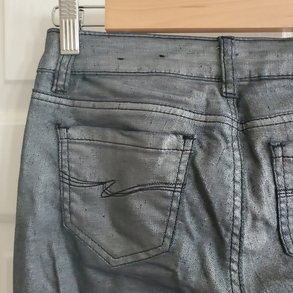Almost Famous Metalic coated jeans size 3